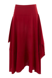 Product shot of The Flowy Skirt in colour Apple (Red), from the front