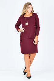 Model Fiona wearing size 16 of The Long Rita Dress in colour Port (Purple), from the front, showing the whole outfit