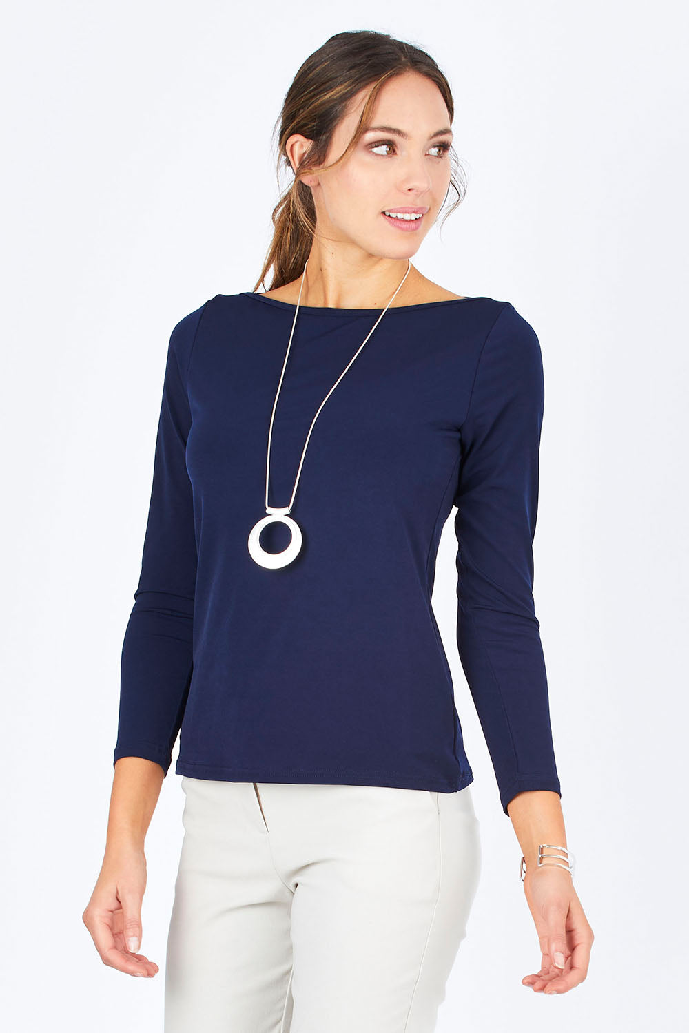 Model Madeline wearing size 10 of The Boat Neck Top in colour Navy (Blue), from the front, cropped image