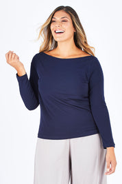 Model Palatina wearing size 14 of The Boat Neck Top in colour Navy (Blue), from the front, cropped image