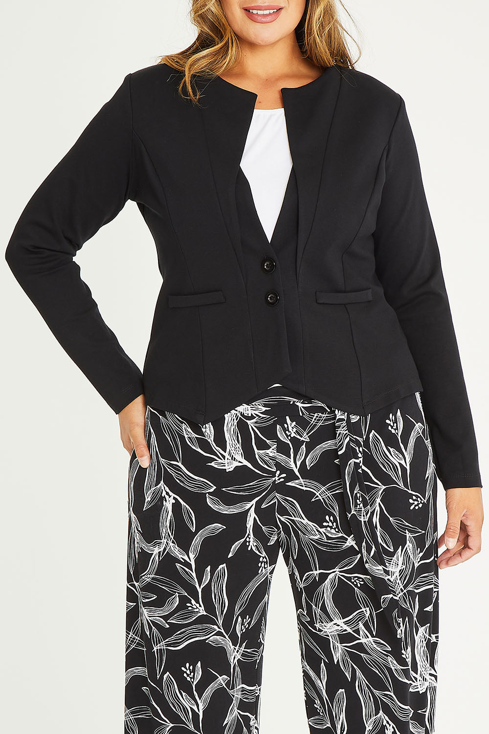Model Palatina wearing size 16 of The Define Ponte Jacket in colour Black (Black), from the front, cropped image