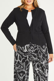 Model Palatina wearing size 16 of The Define Ponte Jacket in colour Black (Black), from the front, cropped image