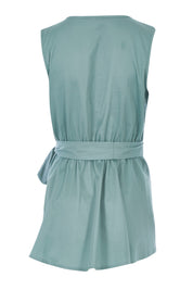 Product shot of The Sleeveless Cotton Wrap Top in colour Sage (Green), from the back