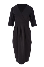 Product shot of The Half Sleeve Tulip Dress in colour Black (Black), from the front