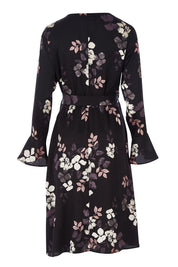 Product shot of The Define Printed Wrap Dress in colour Floral (Black), from the back