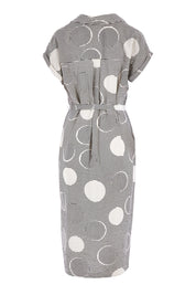 Product shot of The Cotton Blend Button Front Dress in colour Spotstripe (Black), from the back