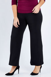 Model Fiona wearing size 16 of The Wide Waistband Basic Pull On Pant in colour Black (Black), from the front, cropped image