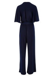 Product shot of The Bell Sleeve Jumpsuit in colour Navy (Blue), from the back