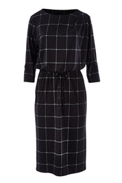 Product shot of The Lined Jersey Dress in colour Checks (Black), from the front