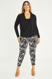 Model Palatina wearing size 16 of The Printed Pull On Pant in colour Zebra (Black), from the front, showing the whole outfit