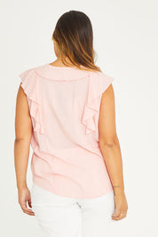 Model Palatina wearing The Flowy Ruffle Top in colour Pink (Pink), from the back
