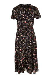 Product shot of The Printed Chiffon Lined Dress in colour Botanical (Black), from the front