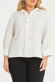Model Katie wearing size 16 of The Frill Placket Cotton Dobby Shirt in colour White (White), from the front, cropped image