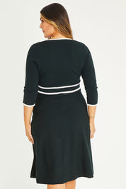 Model Palatina wearing size XL of The Contrast Trim Knit Dress in colour Darkpine (Green), from the back