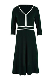 Product shot of The Contrast Trim Knit Dress in colour Darkpine (Green), from the front