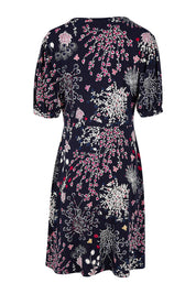 Product shot of The Ruched Waist Detail Dress in colour Garden (Blue), from the back
