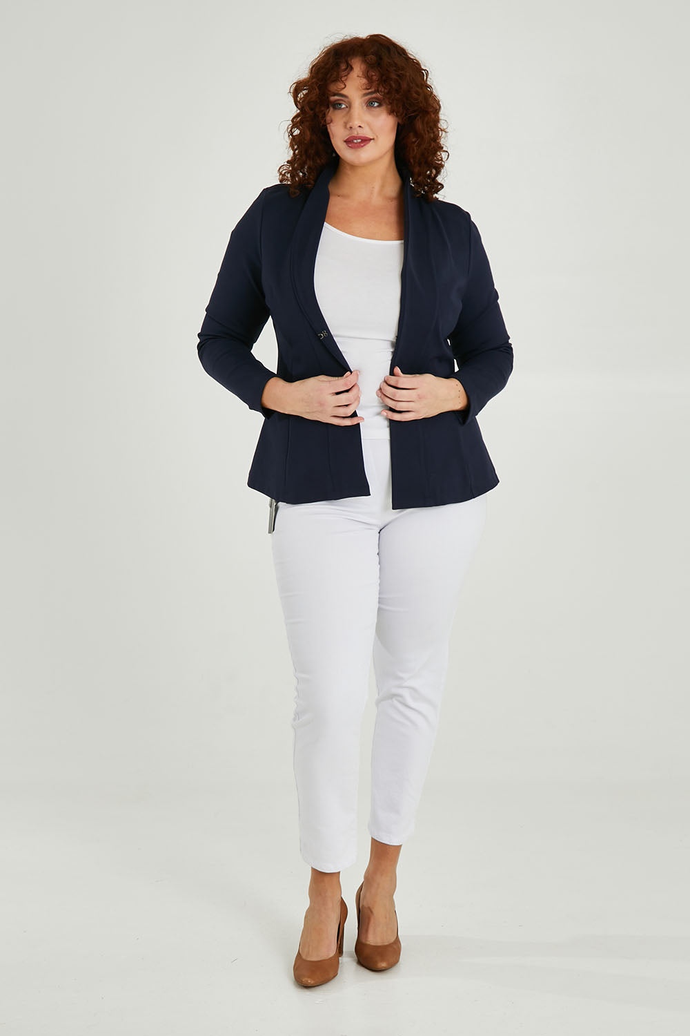 Model Maddy wearing size 16 of The Sculpted Ponte Blazer in colour Darknavy (Blue), from the front, showing the whole outfit