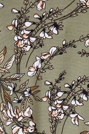 Product shot of The Printed Jersey Faux Wrap Dress in colour Fleur (Green), detail