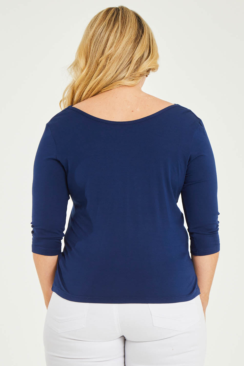 Model Katie wearing size 16 of The Reversible Cowl Neck Top in colour Deepnavy (Blue), from the back