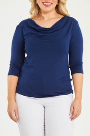 Model Katie wearing size 16 of The Reversible Cowl Neck Top in colour Deepnavy (Blue), from the front, cropped image