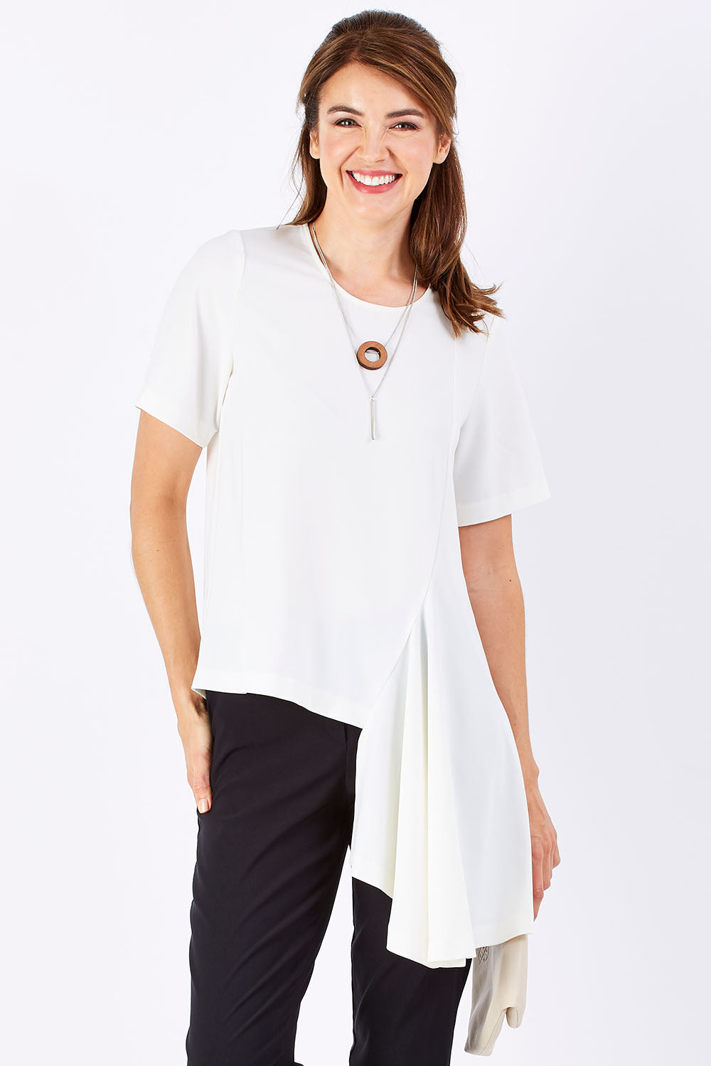 Model Rebecca wearing size 10 of The Side Panel Drape Top in colour OffWhite (White), from the front, cropped image