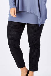 Model Laura wearing size 12 of the Belle Print Bengalene Pant in colour BlackPrint (Black), from the front, cropped image