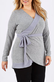 Model Ljubenka wearing size 16 of the Belle Chiffon Trim Cardigan in colour Grey (Grey), from the front, cropped image