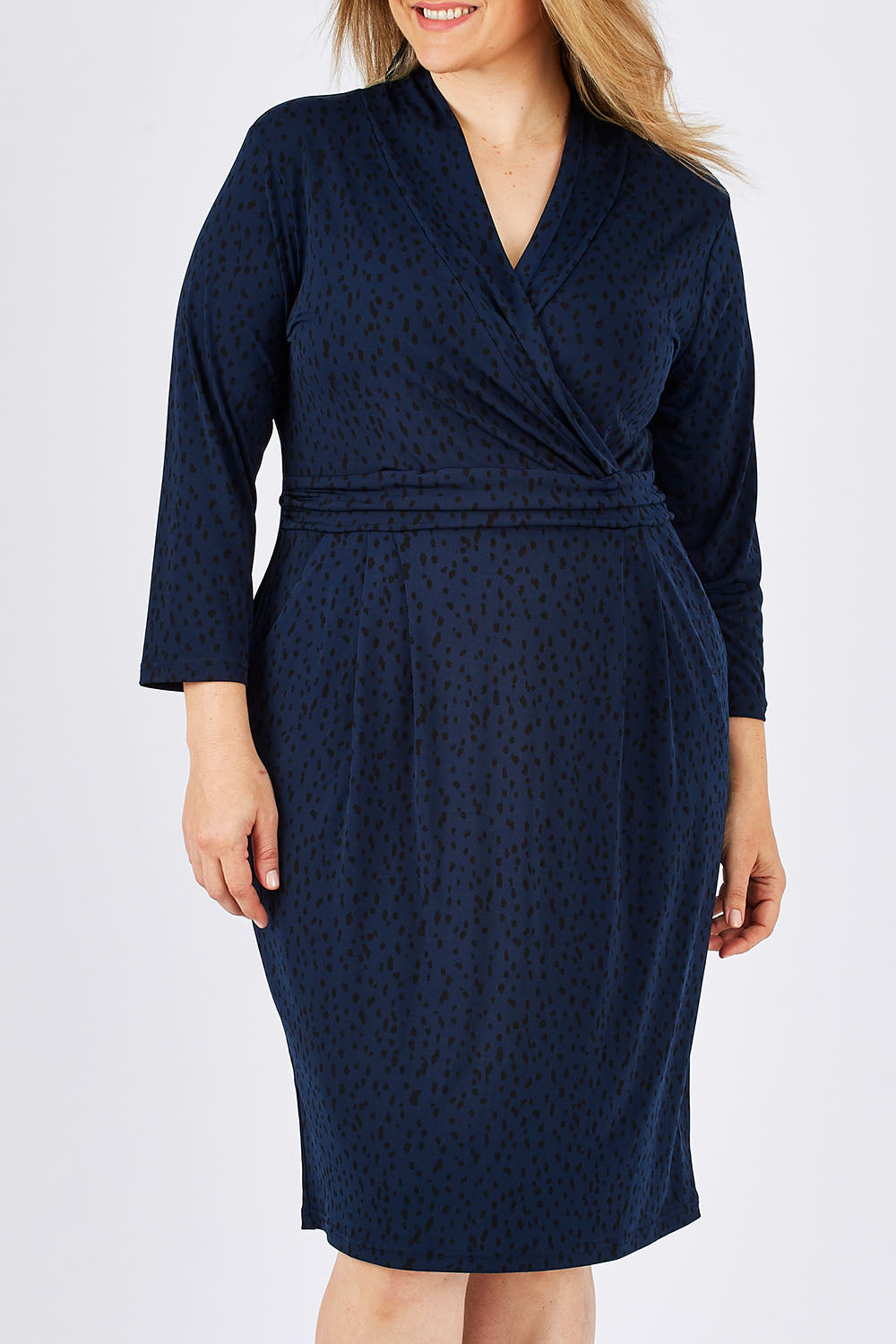 Model Ljubenka wearing size 18 of the Belle Jersey Pockets Dress in colour BluePrint (Blue), from the front, cropped image