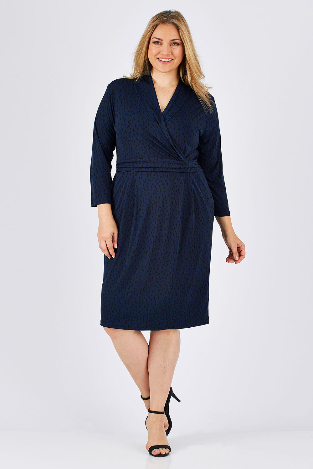 Model Ljubenka wearing size 18 of the Belle Jersey Pockets Dress in colour BluePrint (Blue), from the front, showing the whole outfit