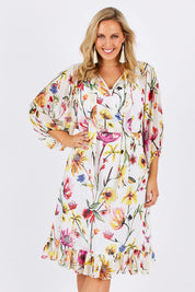 Model Jess wearing size 12 of the Belle Romance Dress in colour Romance (White), from the front, cropped image