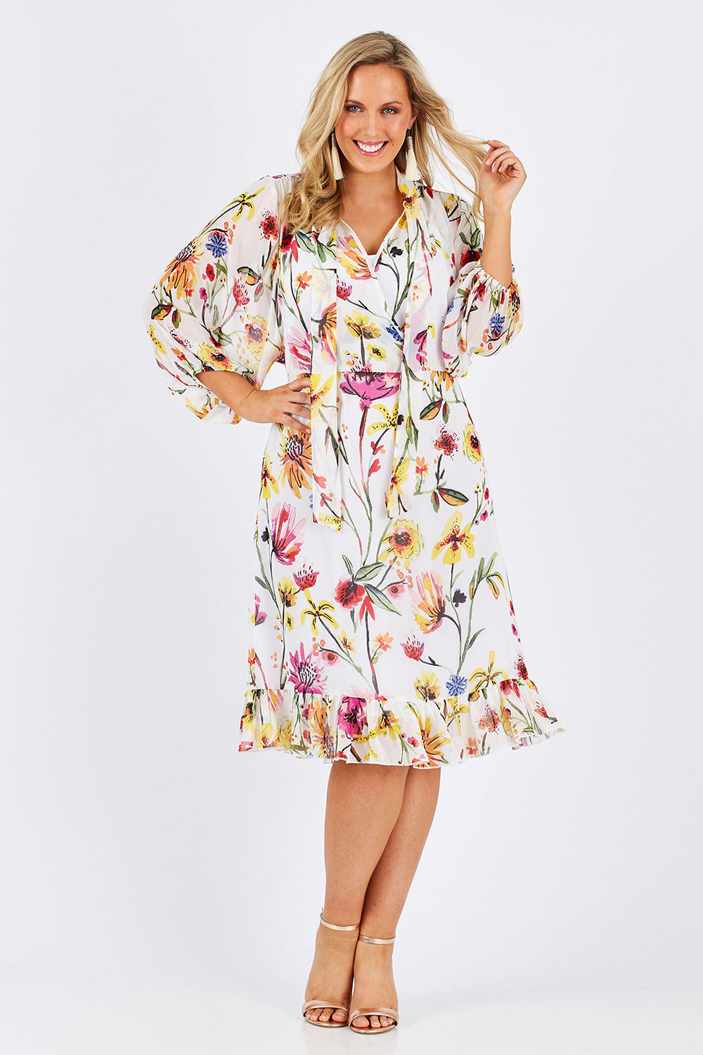 Model Jess wearing size 12 of the Belle Romance Dress in colour Romance (White), from the front, showing the whole outfit
