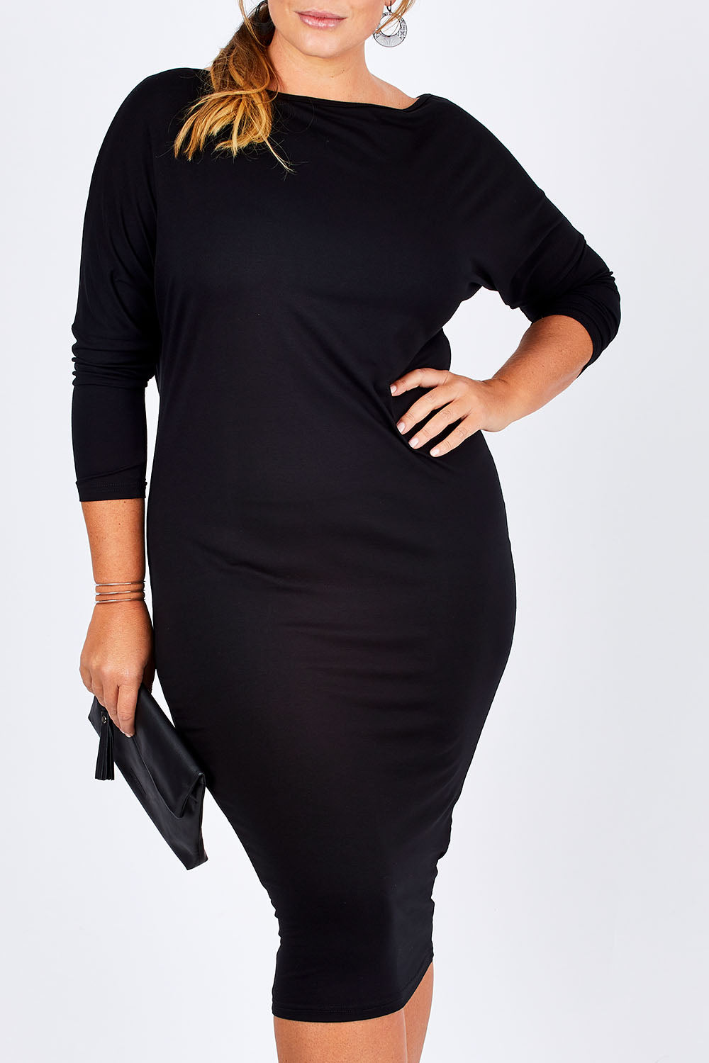 Model Fiona wearing size 16 of the Belle One Shoulder Dress in colour Black (Black), from the front, cropped image