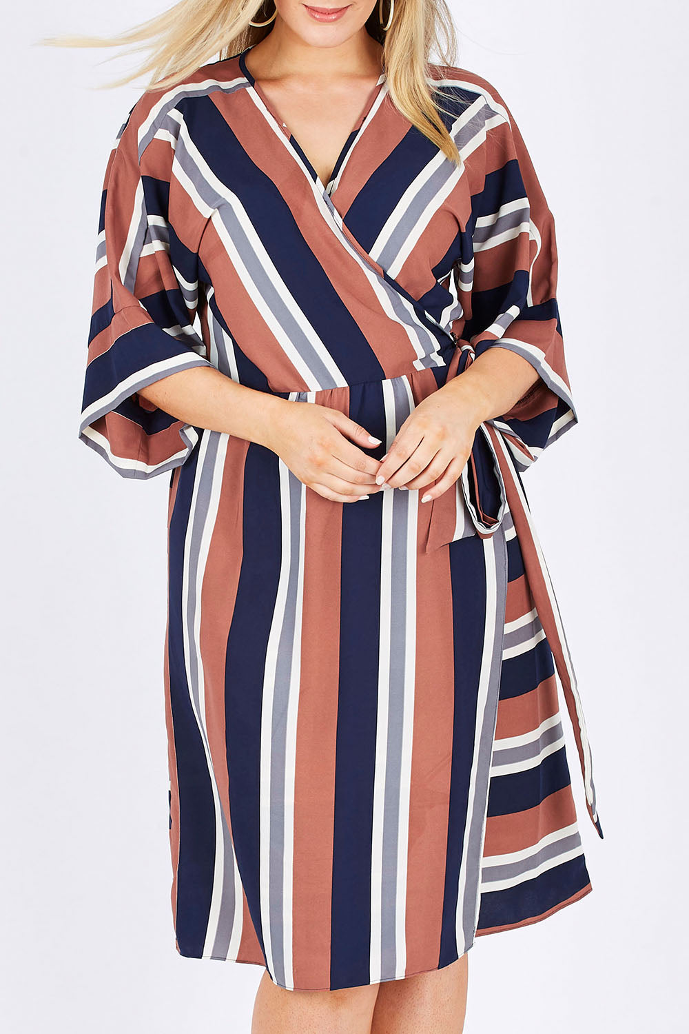 Model Jess wearing size 12 of the Belle Woven Stripe Kimono Dress in colour Stripe, from the front, cropped image