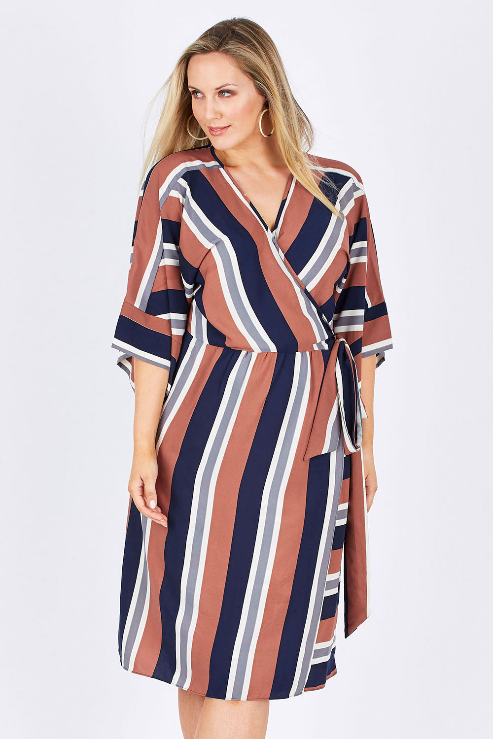 Model Jess wearing size 12 of the Belle Woven Stripe Kimono Dress in colour Stripe, from the front, cropped image
