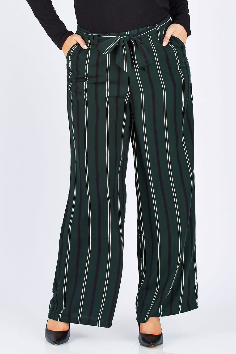 Model Jess wearing size 12 of the Belle Wide Stripe Pant in colour GreenStrip (Green), from the front, cropped image