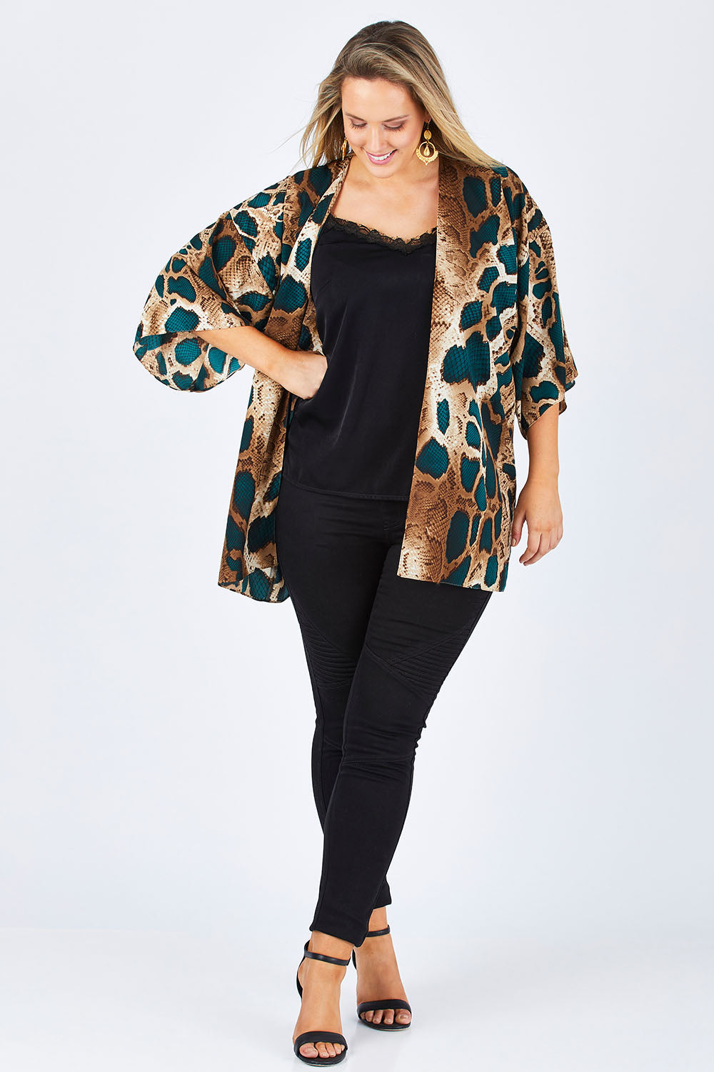 Model Jess wearing size 12 of the Belle Python Print Kimono Jacket in colour Pythprin (Black), from the front, showing the whole outfit