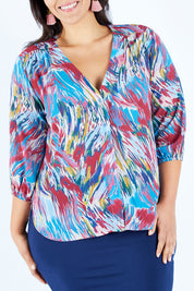 Model Lauren wearing size 16 of the Belle Swirl Print Top in colour Swirlprint (Blue), from the front, cropped image
