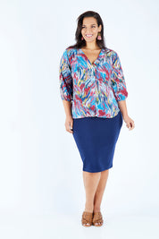 Model Lauren wearing size 16 of the Belle Swirl Print Top in colour Swirlprint (Blue), from the front, showing the whole outfit