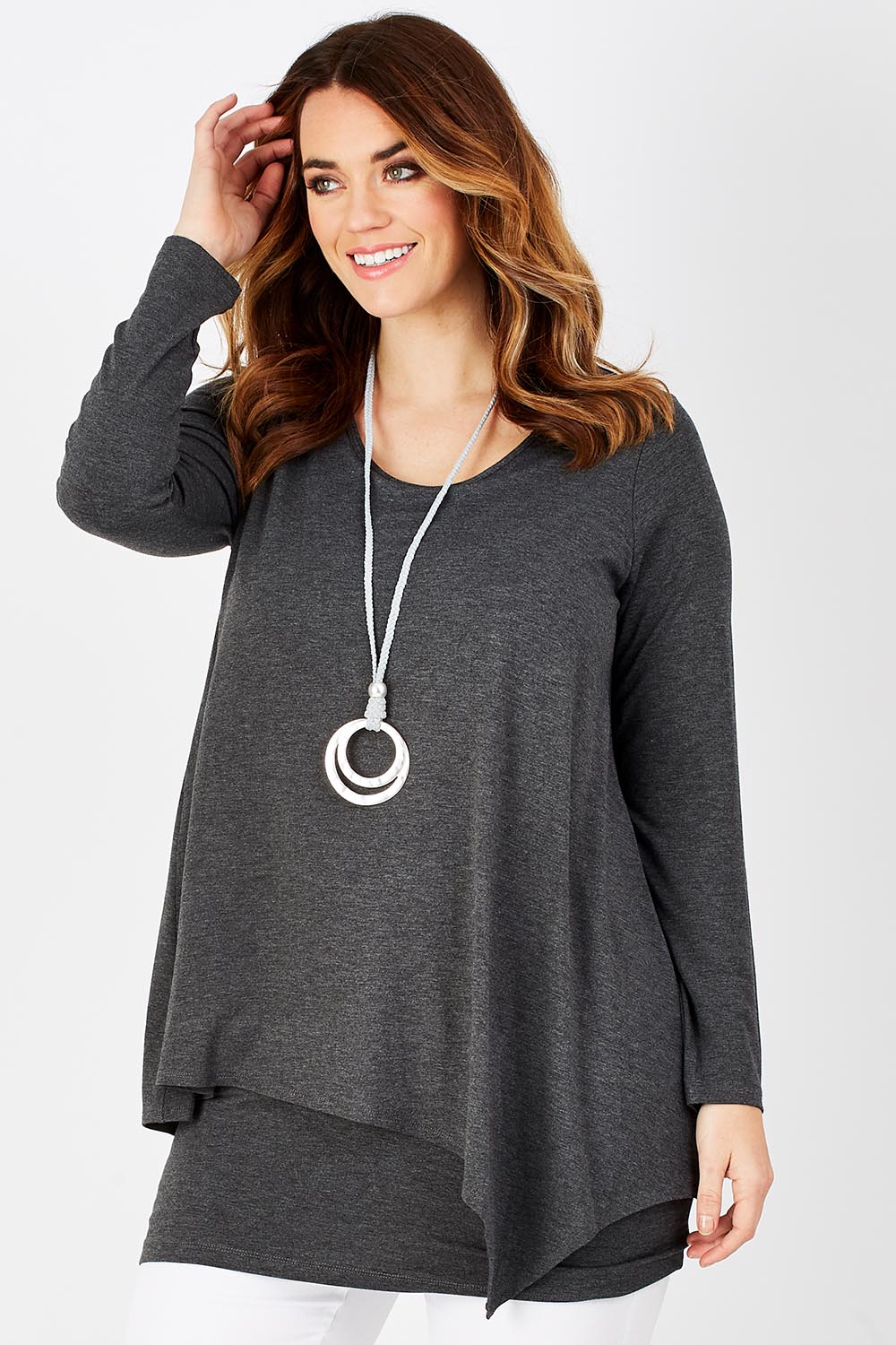 Model Laura wearing size 12 of the Belle Forgiver Tunic in colour Charcoal (Grey), from the front, cropped image