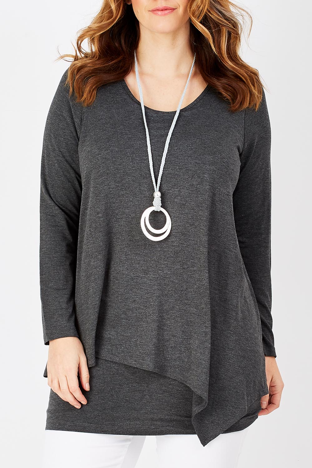 Model Laura wearing size 12 of the Belle Forgiver Tunic in colour Charcoal (Grey), from the front, cropped image