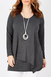 Model Laura wearing size 12 of the Belle Forgiver Tunic in colour Charcoal (Grey), from the front, cropped image