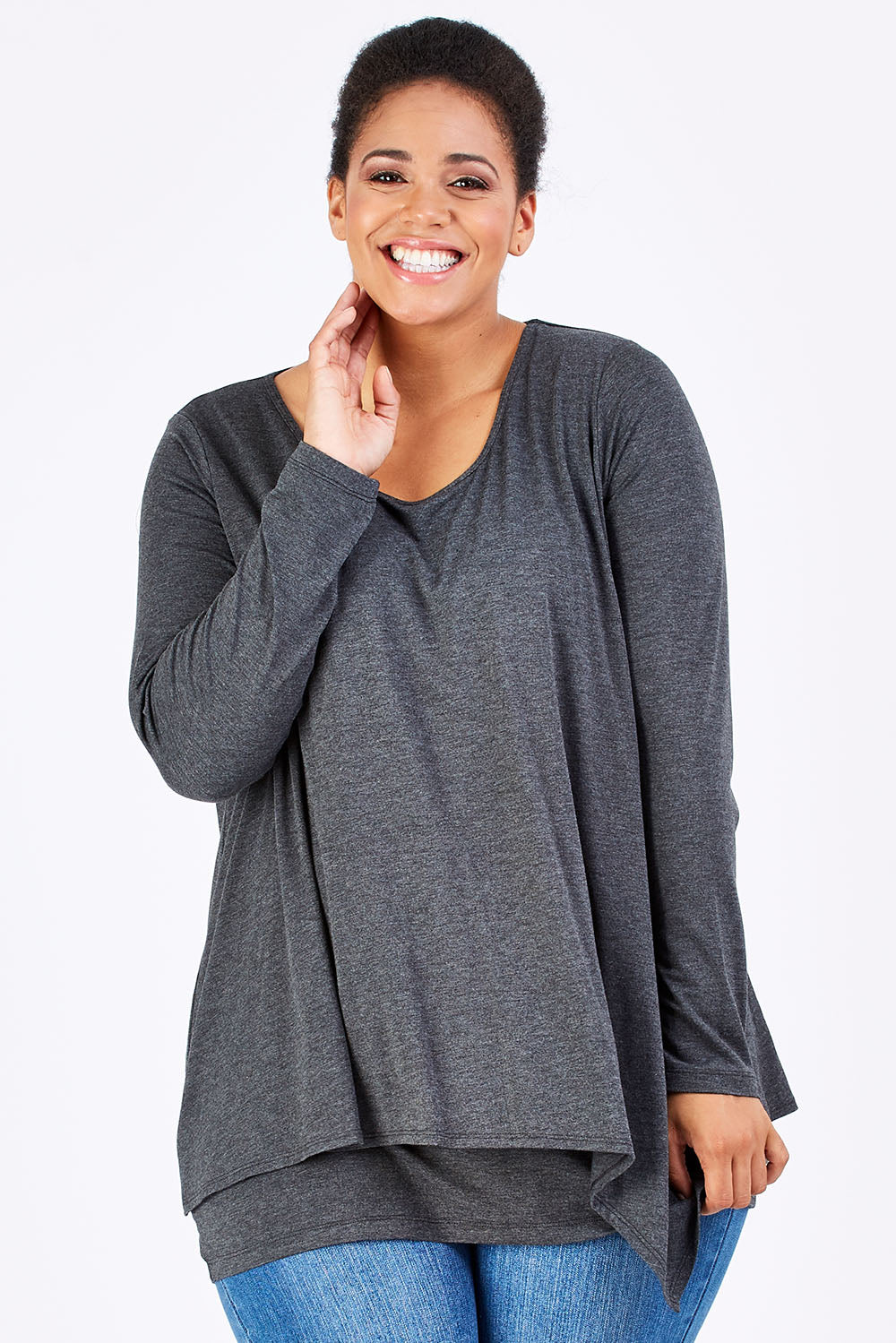 Model Shareefa wearing size 18 of the Belle Forgiver Tunic in colour Charcoal (Grey), from the front, cropped image