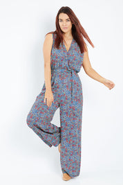 Model Laura wearing size 12 of the Belle Ditsy Floral Jumpsuit in colour Ditsyflora (Blue), from the front, showing the whole outfit