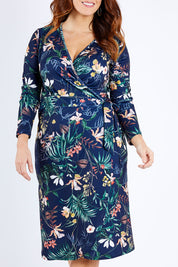 Model Laura wearing size 12 of the Belle Paradise Floral Dress in colour Paradise (Black), from the front, cropped image