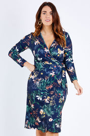 Model Laura wearing size 12 of the Belle Paradise Floral Dress in colour Paradise (Black), from the front, cropped image