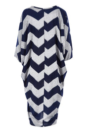 Product shot of the Belle Chevron Relaxed Knit Dress in colour Navychev (Blue), from the back