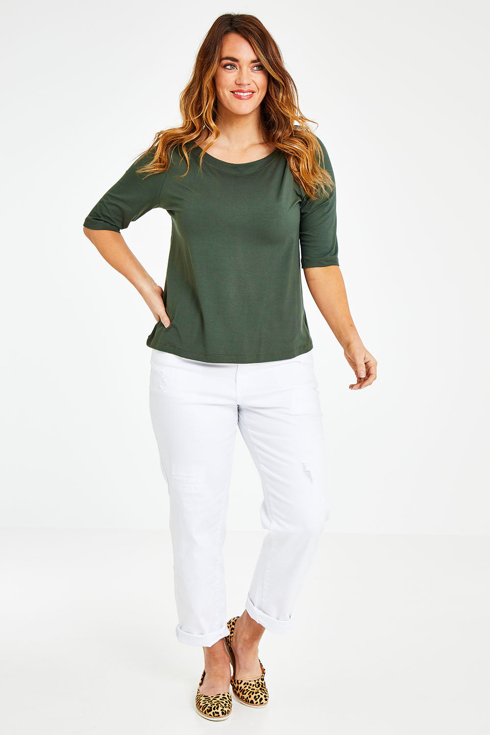 Model Laura wearing size 12 of the Belle Boat Neck Tee in colour Khaki (Green), from the front, showing the whole outfit