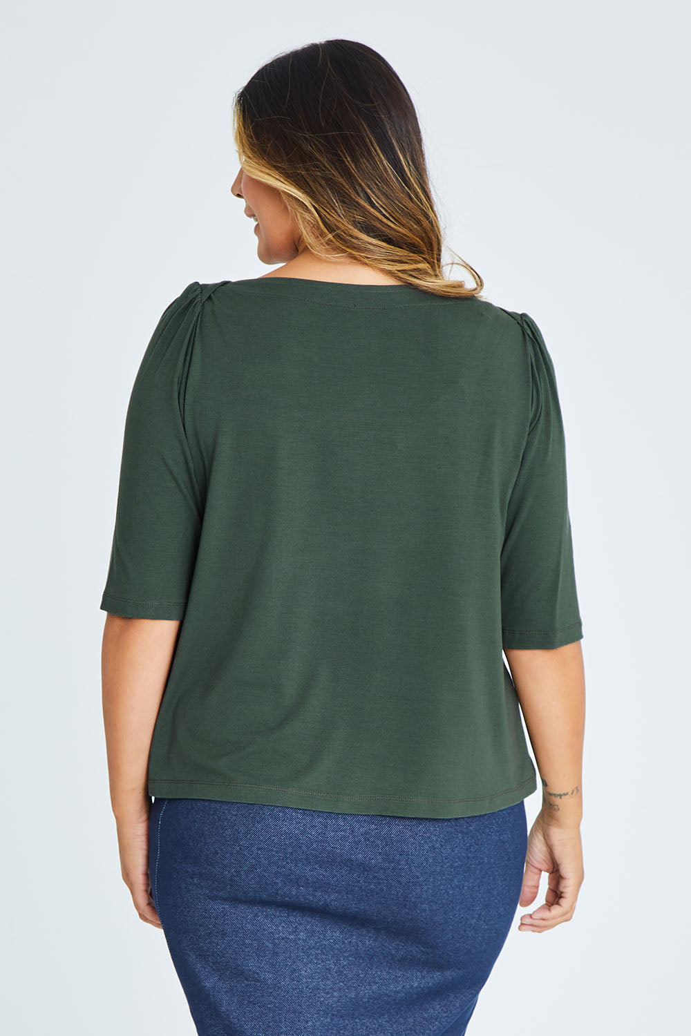 Model Palatina wearing size 16 of the Belle Boat Neck Tee in colour Khaki (Green), from the back