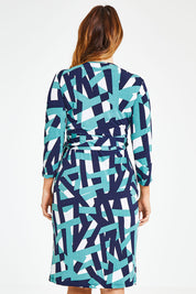 Model Laura wearing size 12 of the Belle Abstract Wrap Dress in colour Abstract (Green), from the back