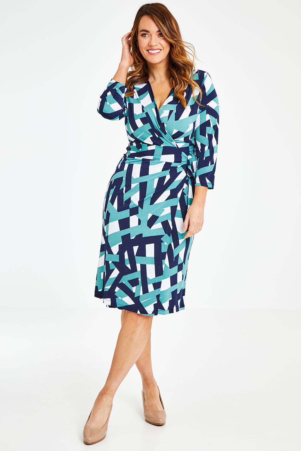 Model Laura wearing size 12 of the Belle Abstract Wrap Dress in colour Abstract (Green), from the front, showing the whole outfit